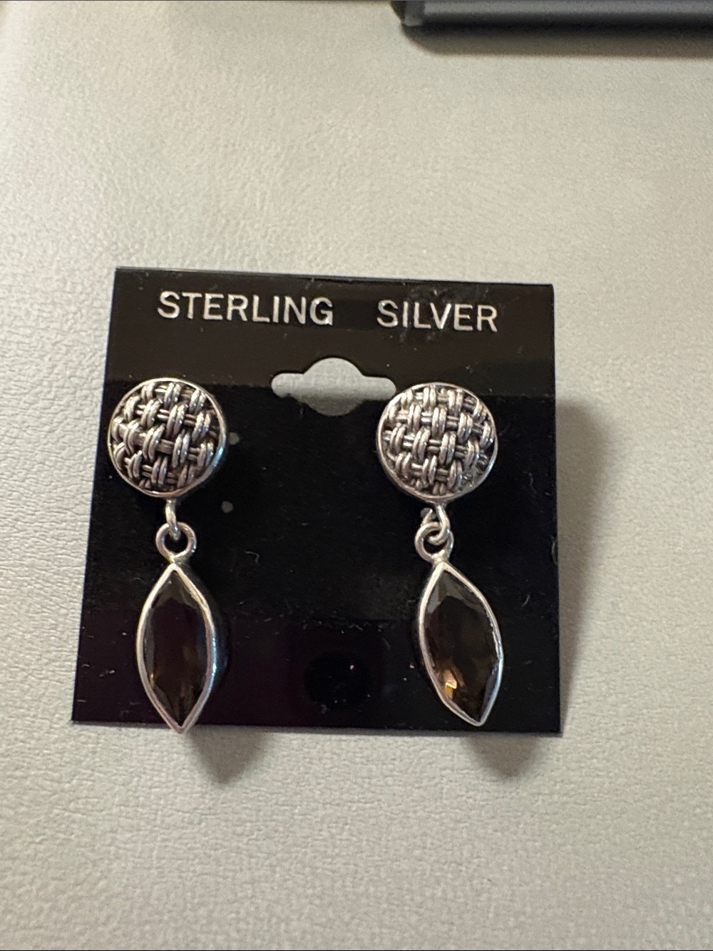 Lori Bonn sterling silver textured earrings with smoky quartz stones.